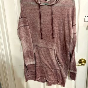 Worn burgundy sweatshirt